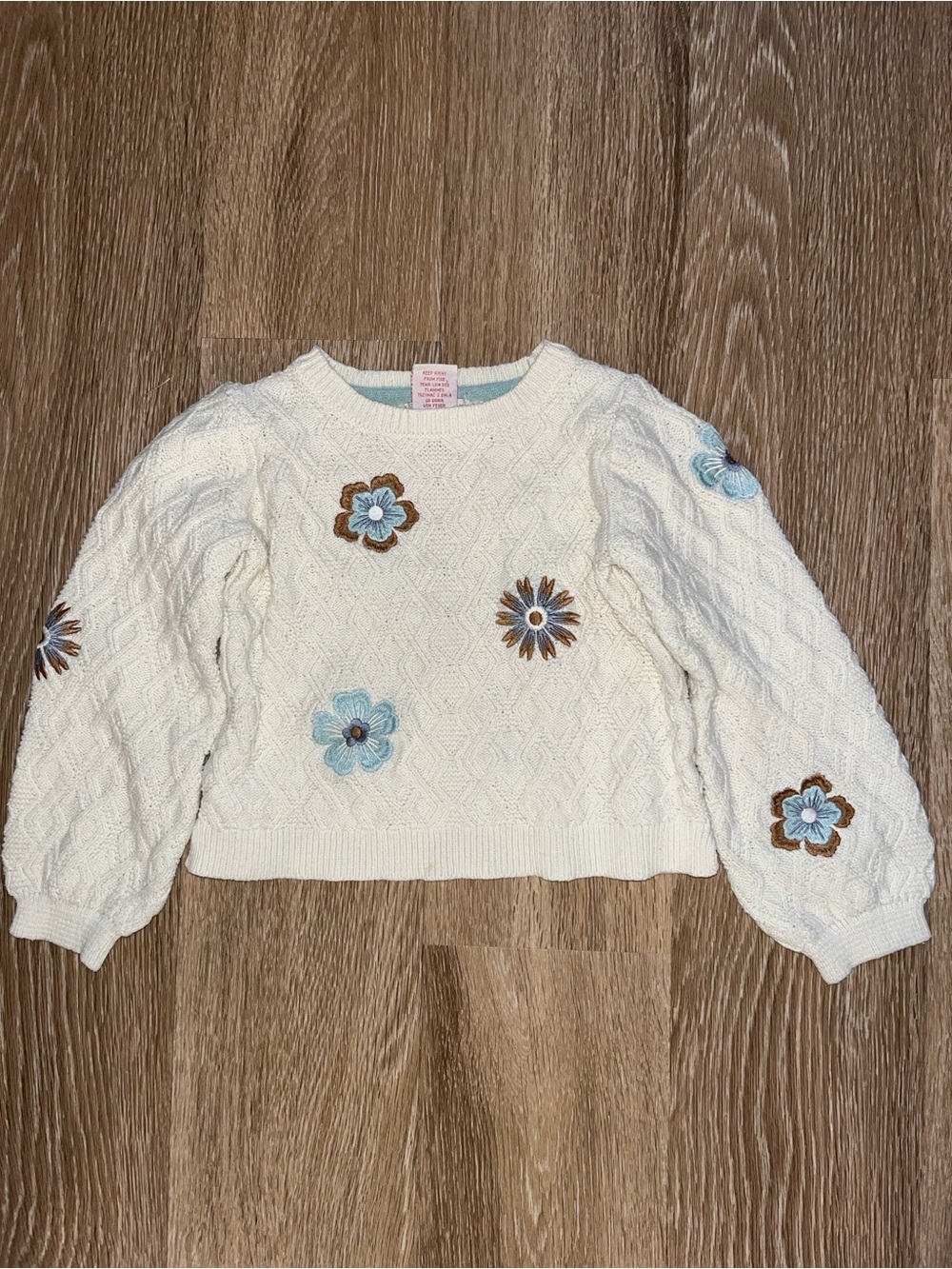 Cynthia Rowley Cream Cable Knit Sweater with Blue and Brown Floral Appliqué